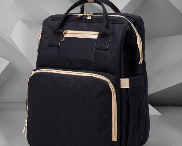 Multifunction Diaper Bag Backpack – USB Charging Baby Bag with Foldable Travel Bed