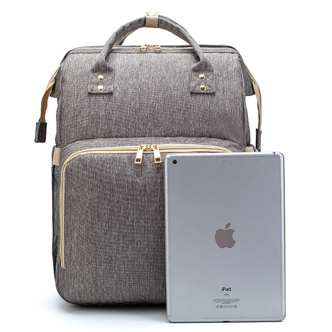 Multifunction Diaper Bag Backpack – USB Charging Baby Bag with Foldable Travel Bed