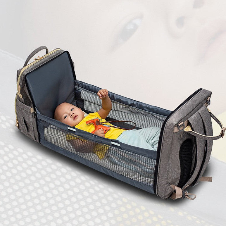 Multifunction Diaper Bag Backpack – USB Charging Baby Bag with Foldable Travel Bed